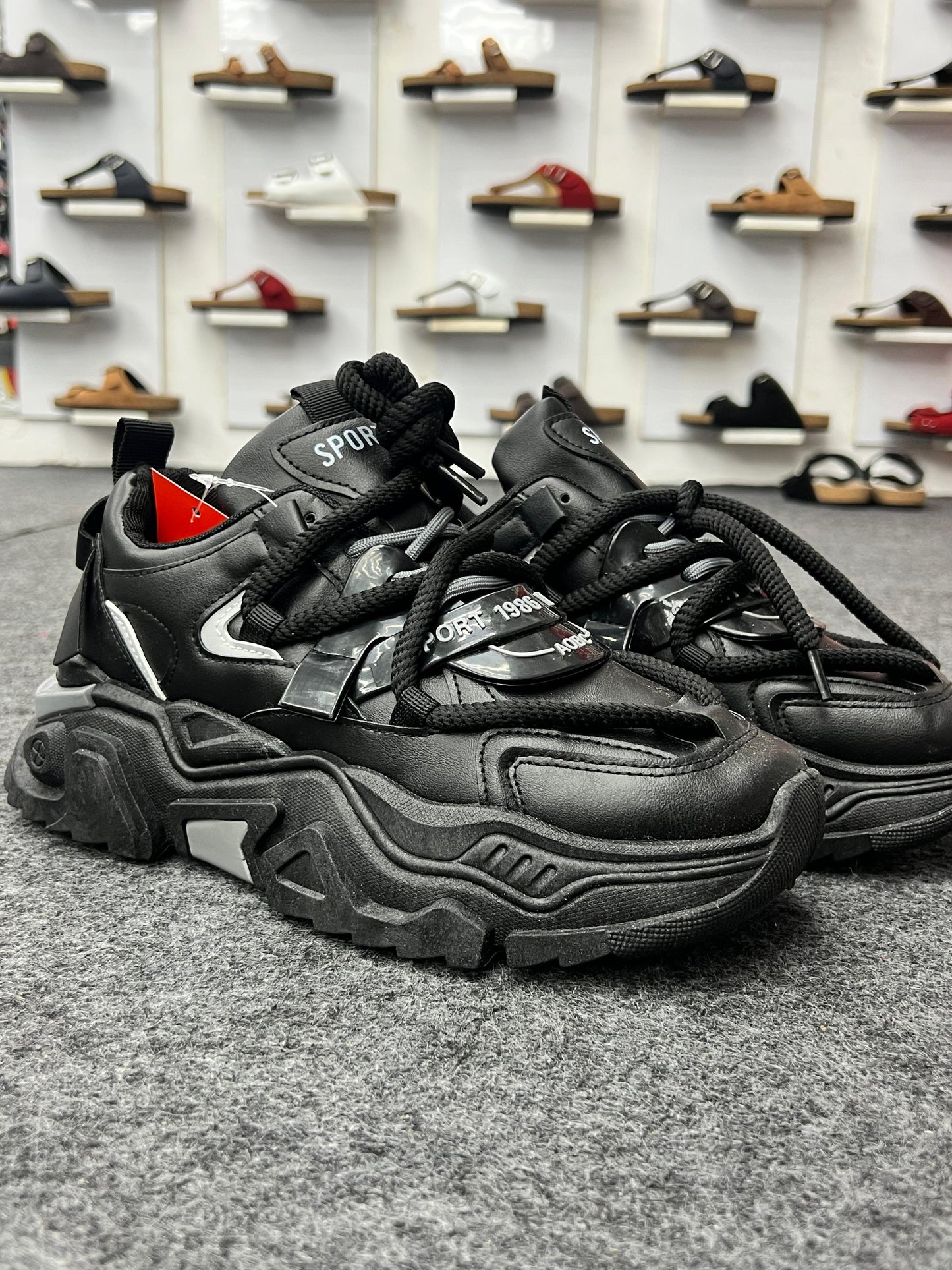 Bold and chunky black sneakers