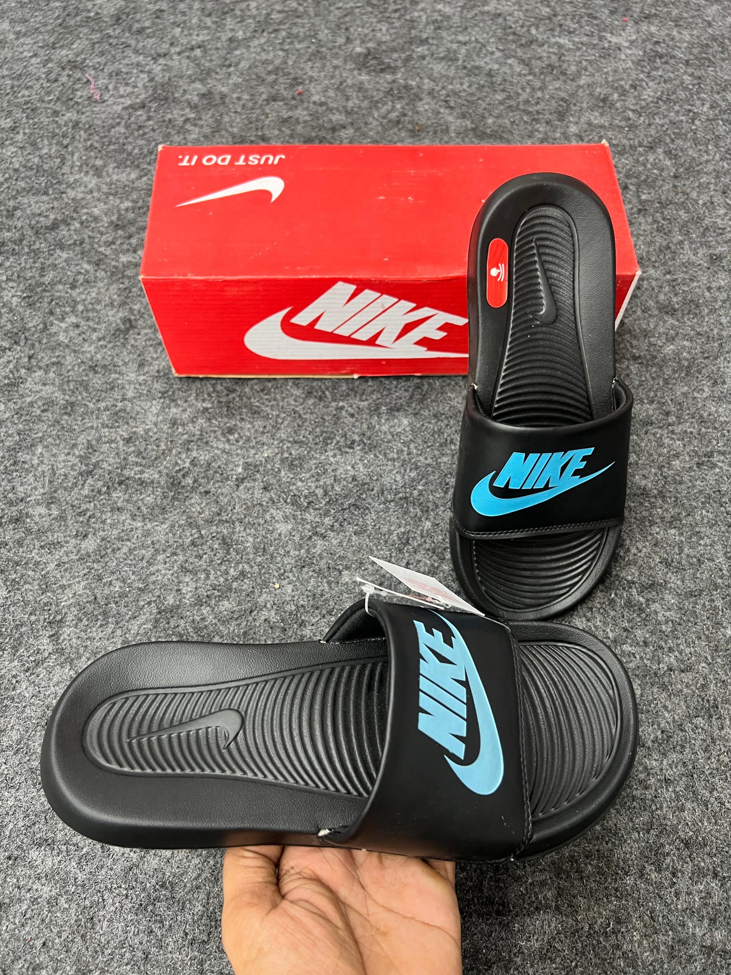 Nike Black Slides with Sky Blue Logo