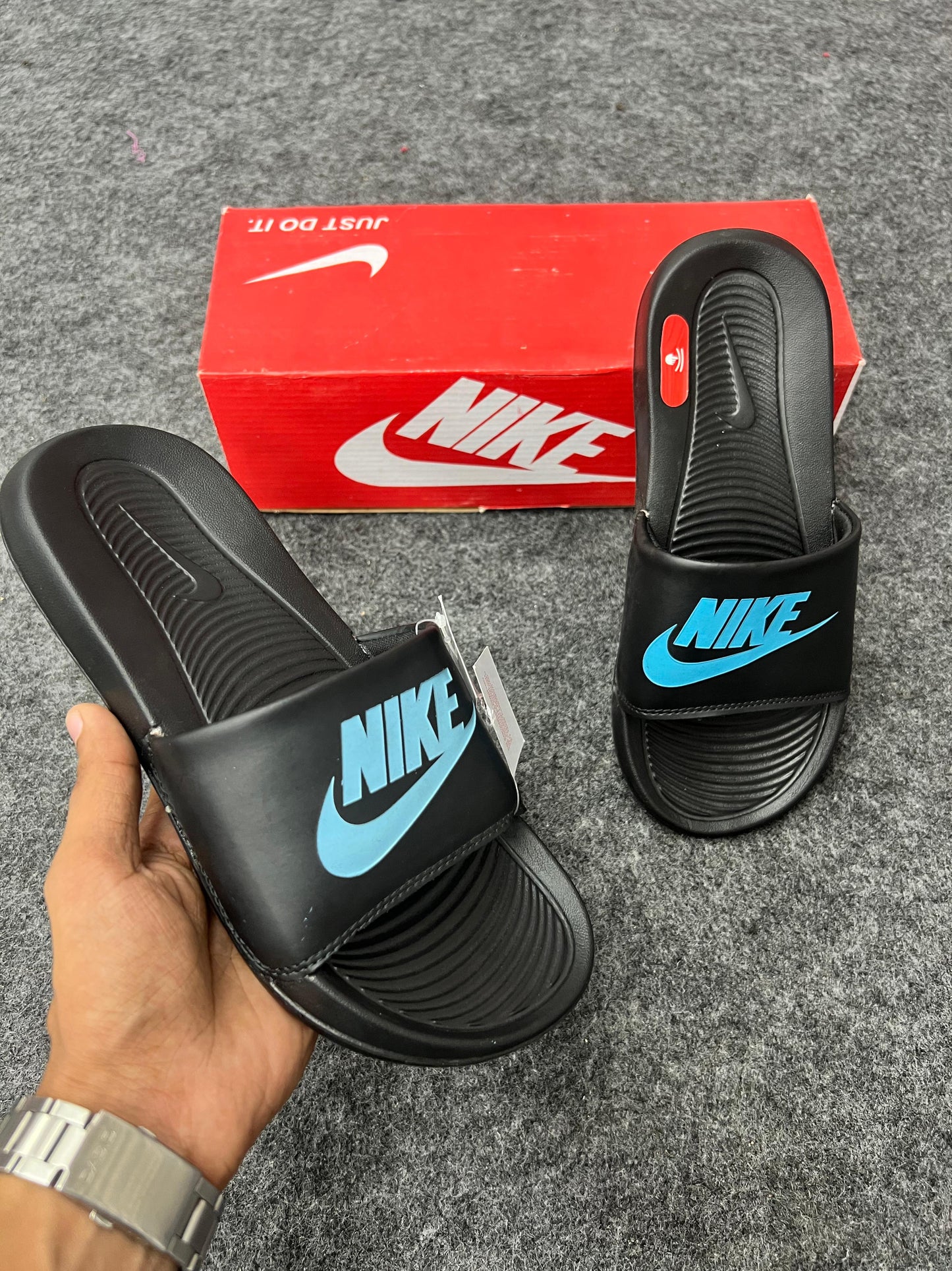 Nike Black Slides with Sky Blue Logo