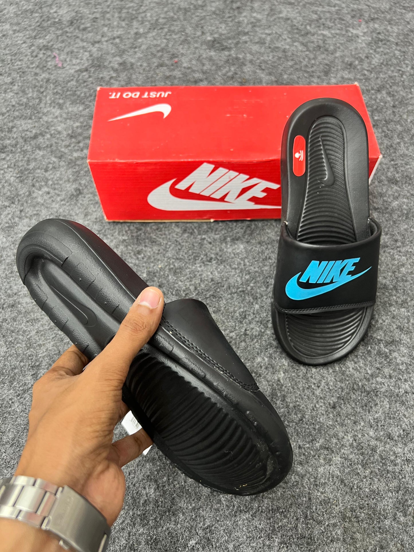 Nike Black Slides with Sky Blue Logo