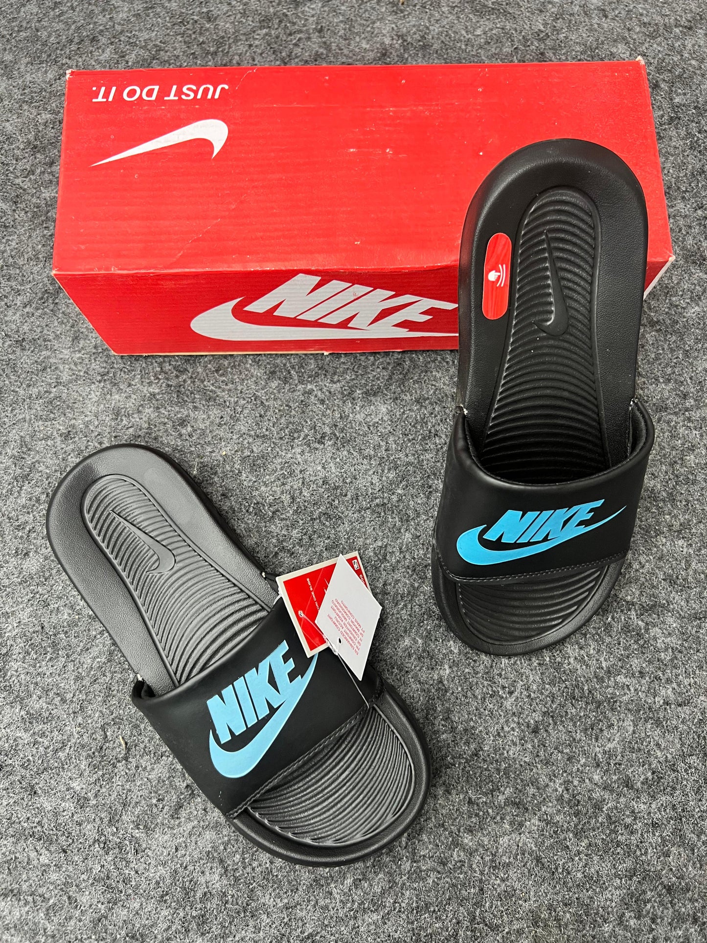 Nike Black Slides with Sky Blue Logo