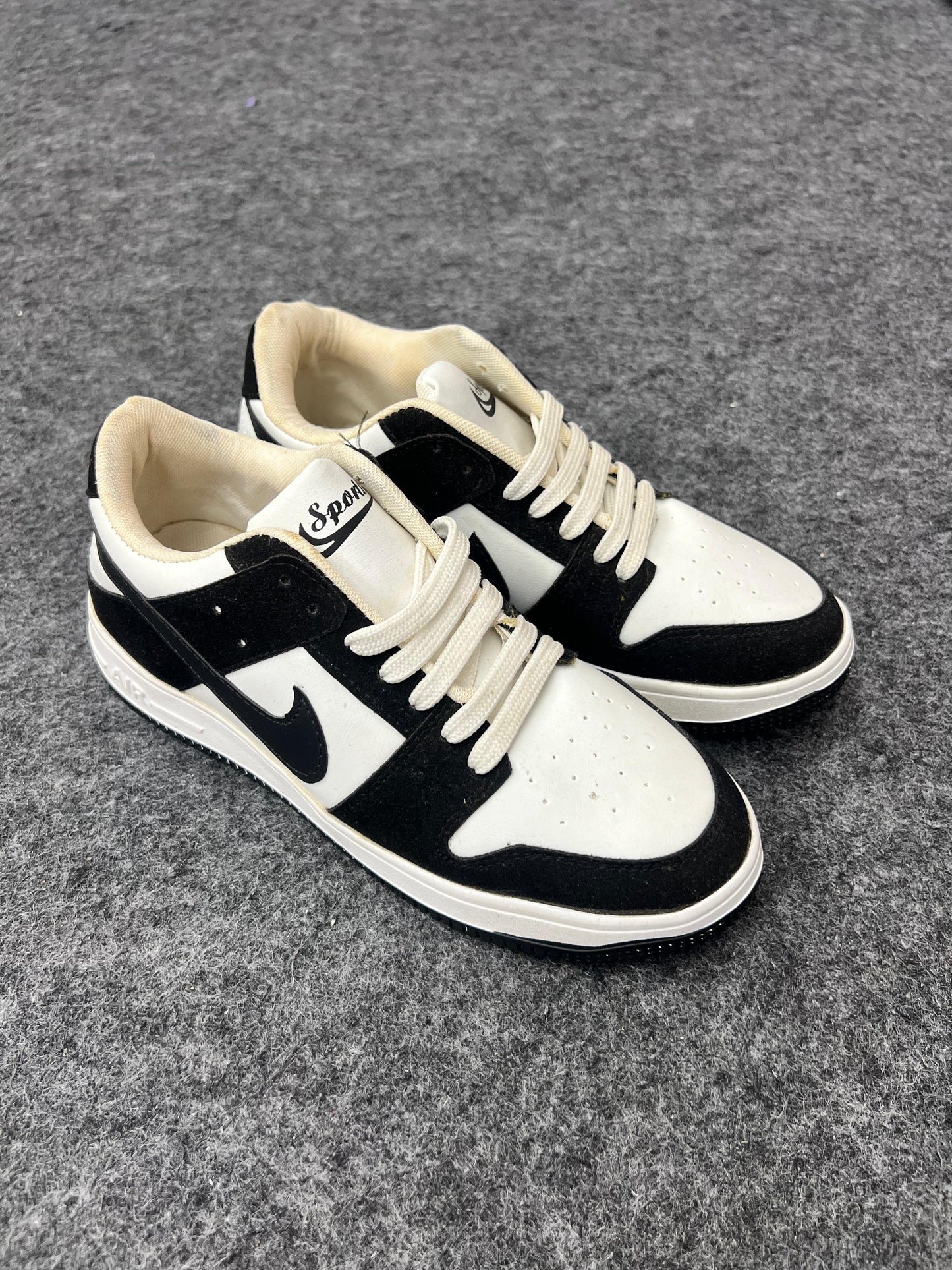 black and white low-top sneakers