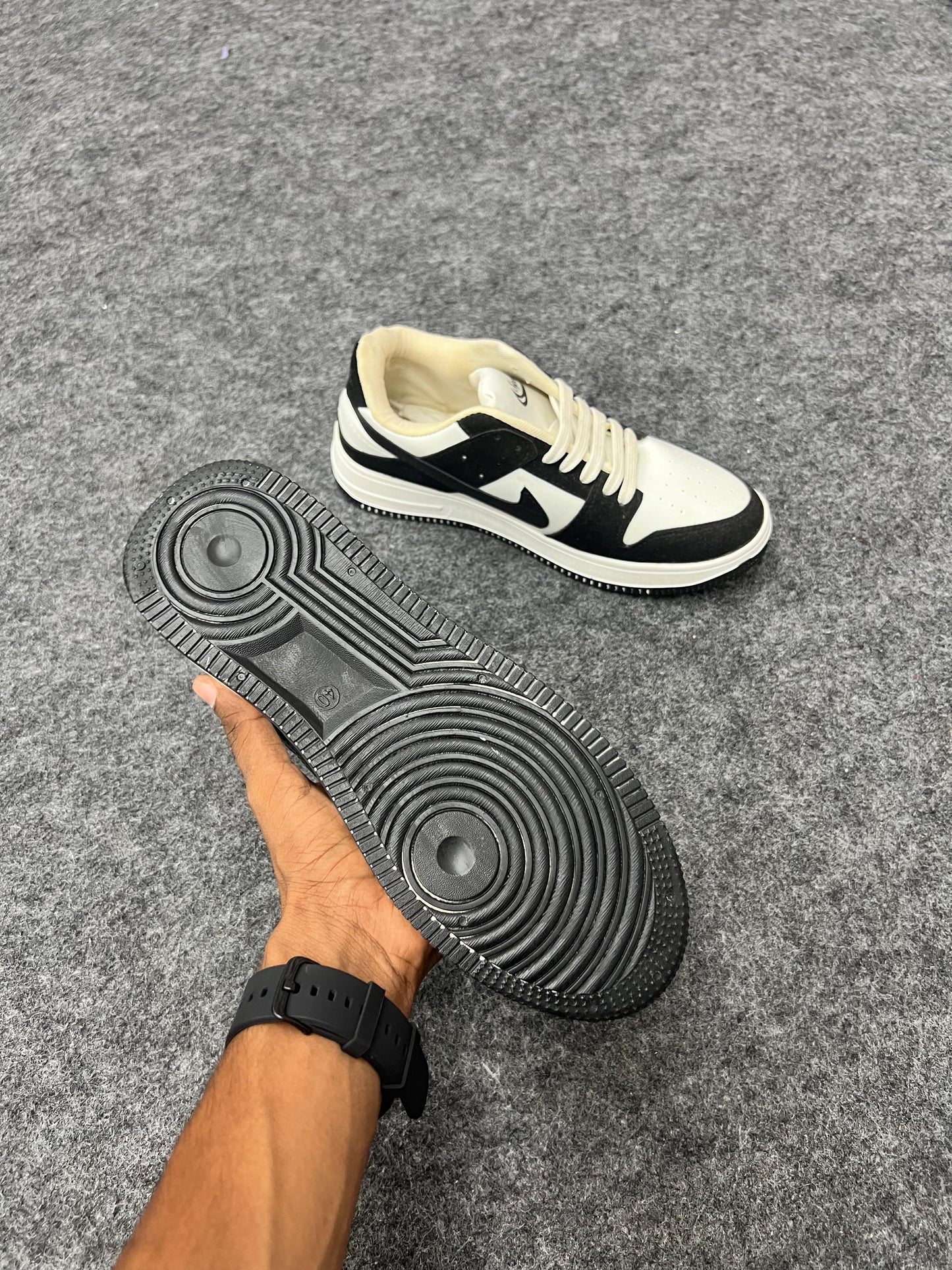 black and white low-top sneakers