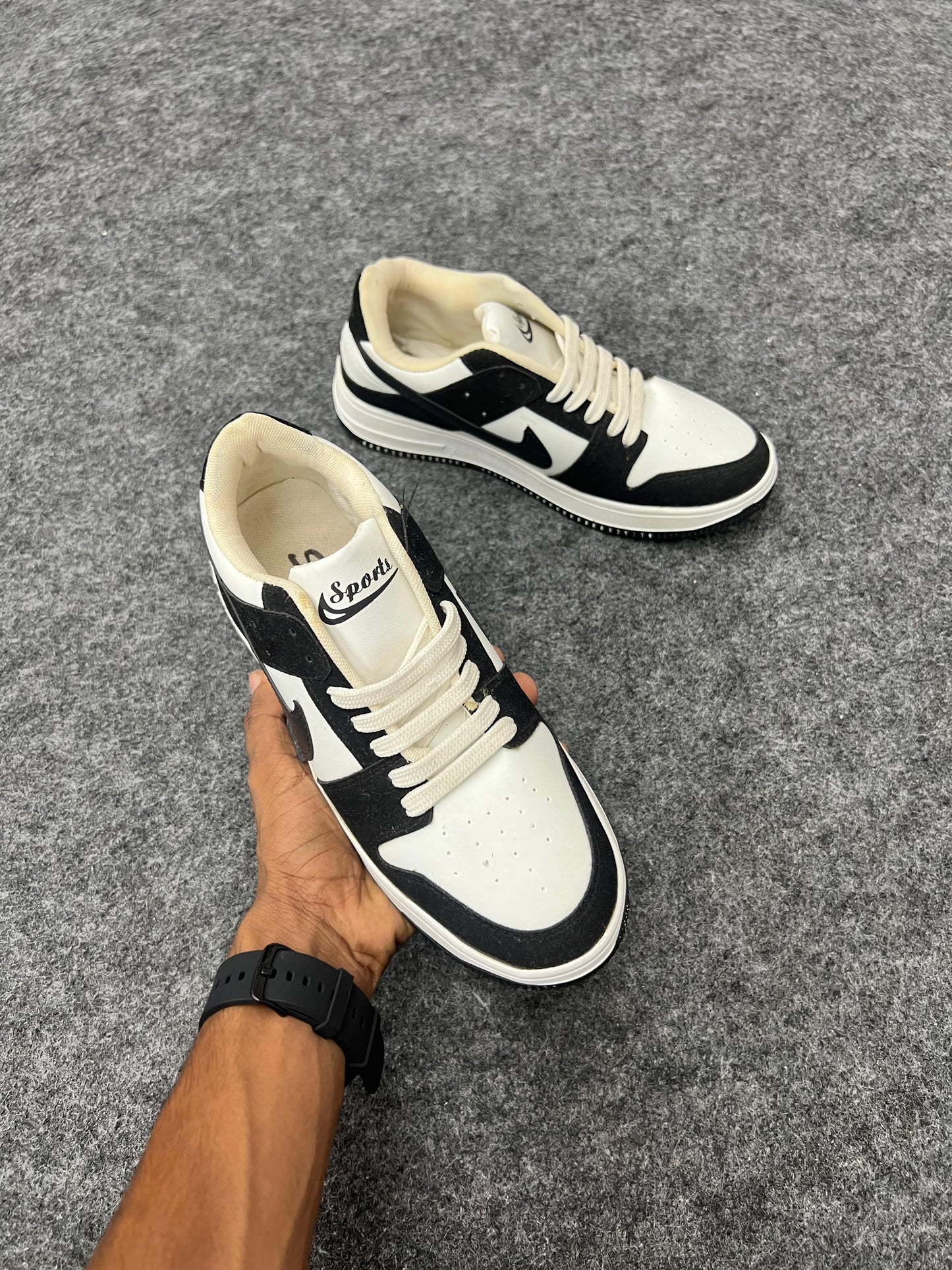 black and white low-top sneakers