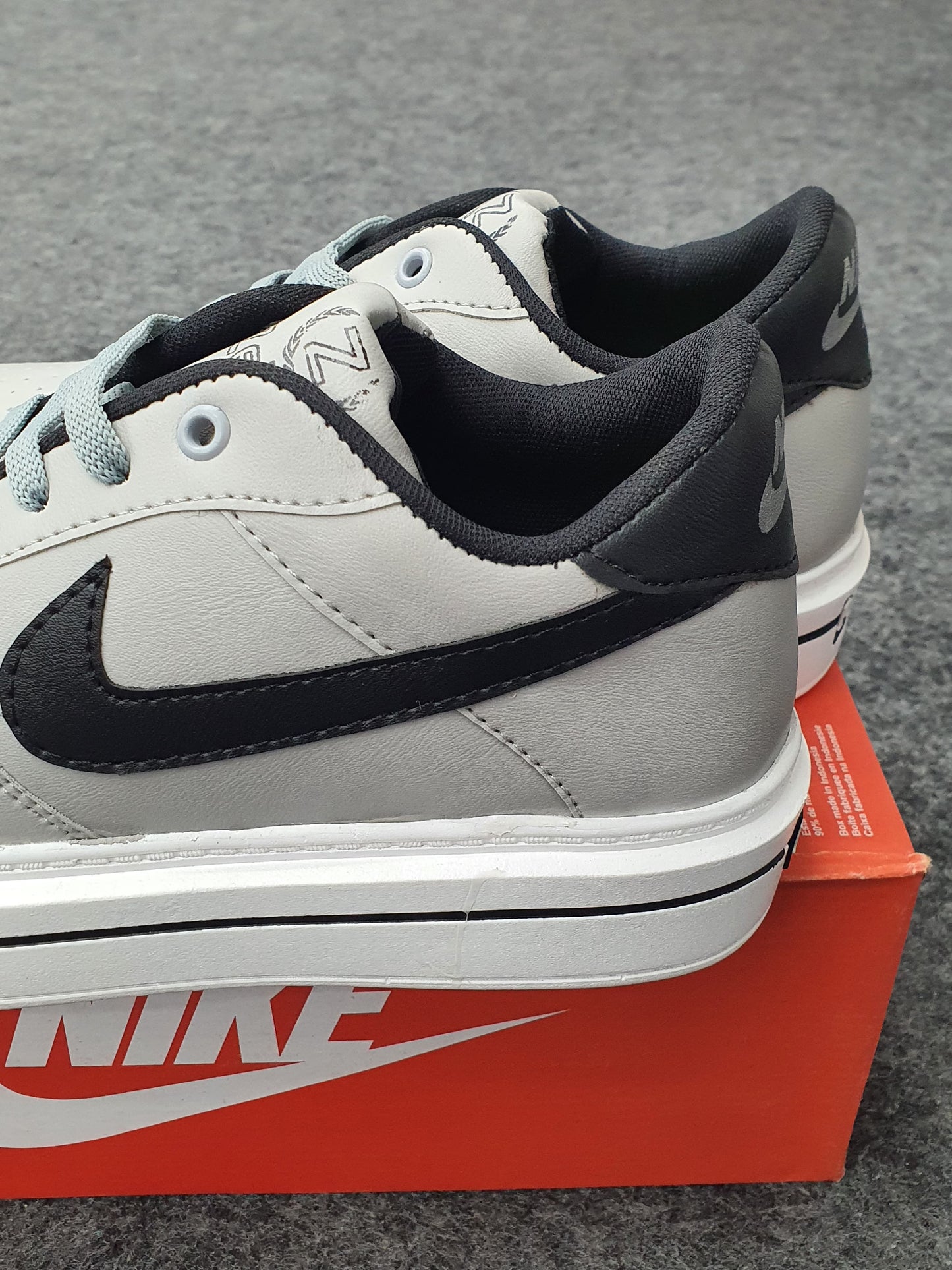 White Gray and Black |  Low-Top Air Jordan sneaker
