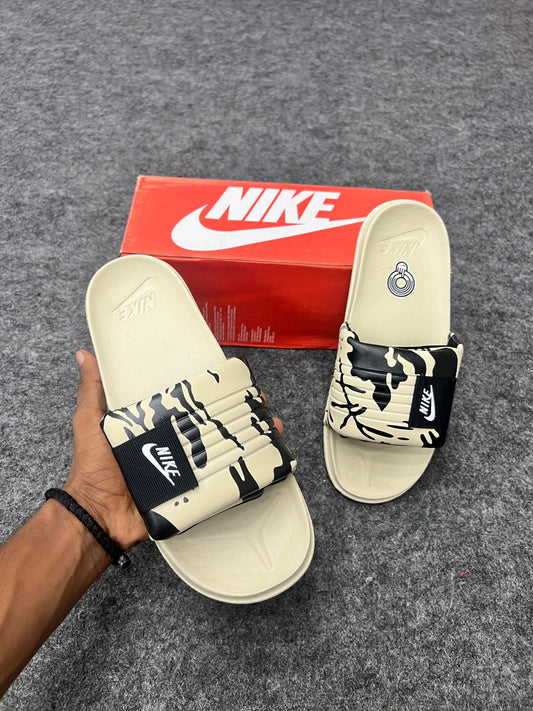 Trendy Nike slides  beige and black camo strap