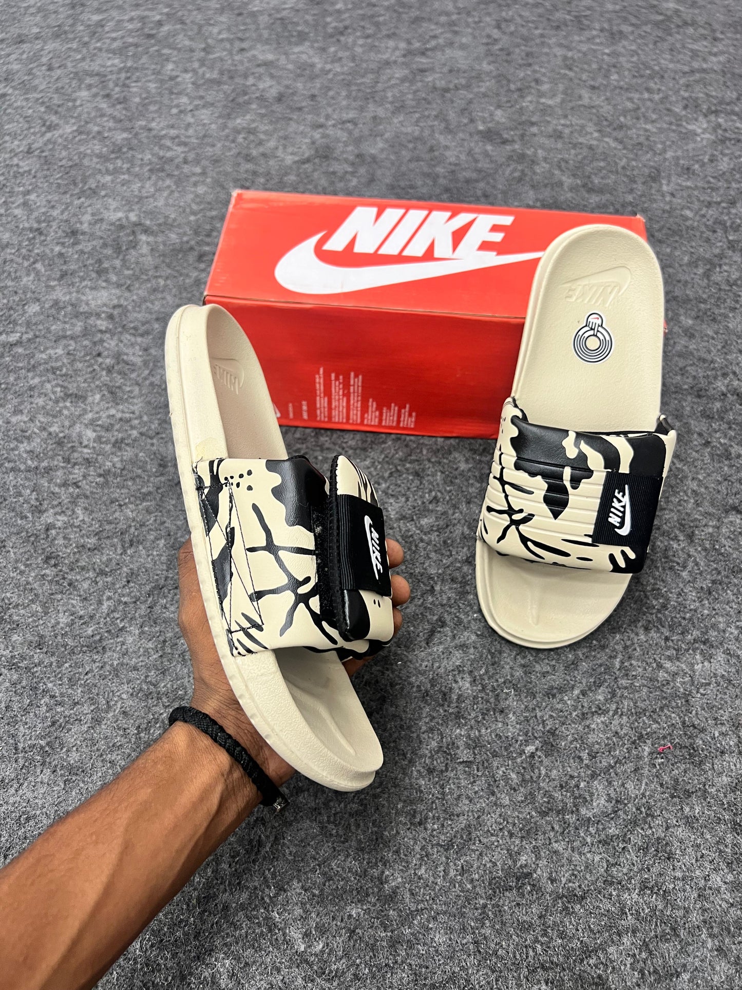 Trendy Nike slides  beige and black camo strap