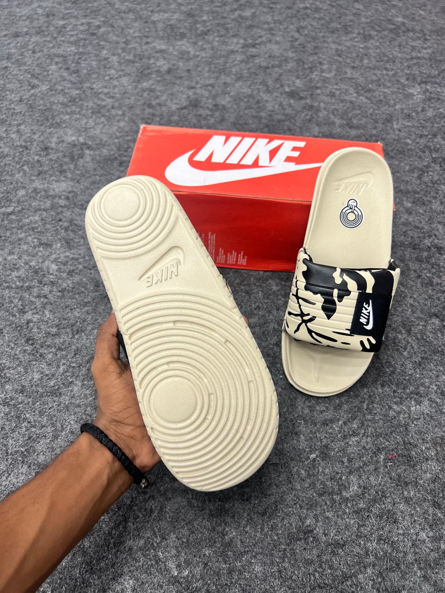 Trendy Nike slides  beige and black camo strap