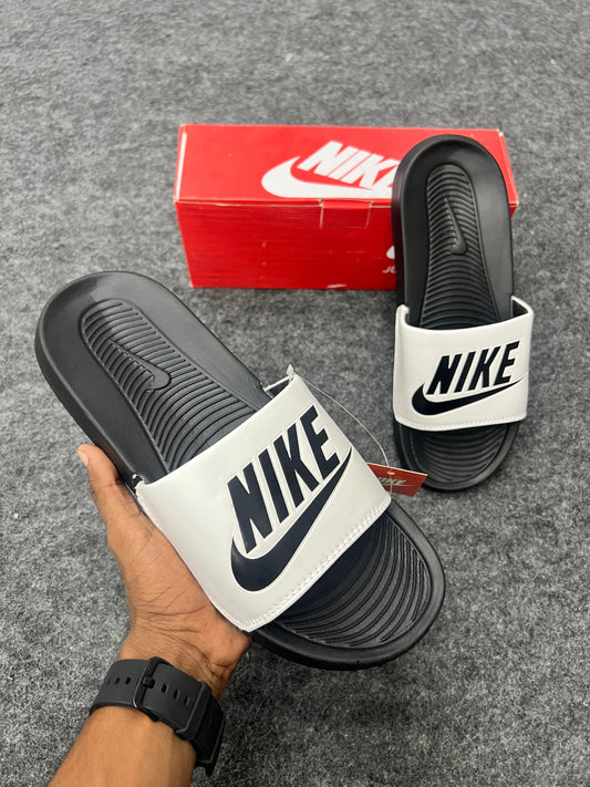 bold black logo on a white strap NIKE SLIDES
