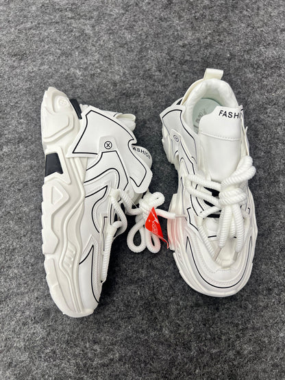 Chunky white sneakers with bold black