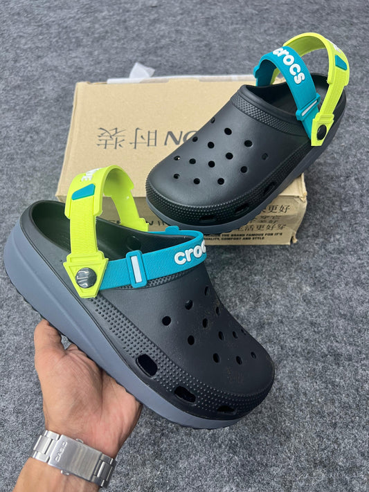 Black Crocs featuring dual-tone straps